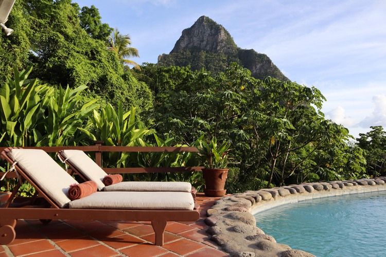 Stonefield Villa Resort - 🧘‍♀️🌿🦎 Our outdoor yoga studio is 900 square  feet of tranquility, with awe-inspiring views of the ocean and rainforest.  Guests have the option of using our indoor studio